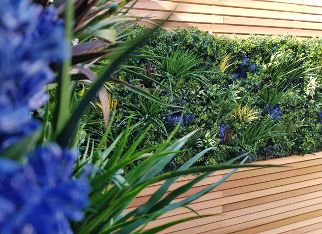 cedar battens with artificial green wall panels